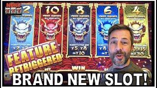 IT'S A BRAND NEW SLOT!  5 DRAGONS RISING JACKPOTS and I retriggered in the bonus!