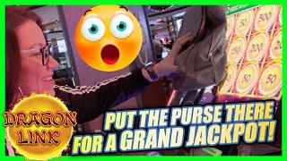 LADY HOLDS HER PURSE FOR A GRAND JACKPOT! BUT DOES IT WORK?    DRAGON LINK JACKPOT HANDPAY!