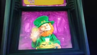 Feature comes up LEPRECHAUN...."OVER 100 FREE SPIN" Comes up....SLOT MACHINE GAME